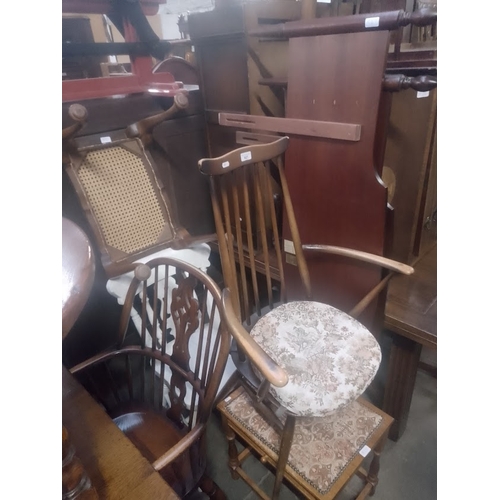 921 - Various items of furniture; Ercol carver, white painted chair, two stools and a mahogany headboard &... 