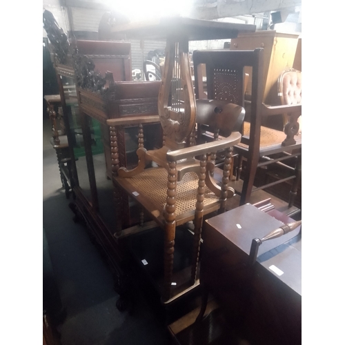 941 - An Edwardian mahogany card table, a mahogany lyre base occasional table and tub chair on bobbin turn... 