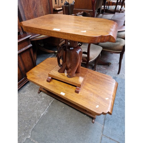 976 - Two carved hardwood elephant tables.