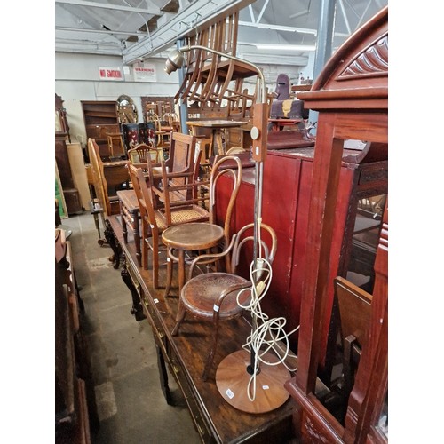 950 - A mid 20th century teak and chrome floor lamp.