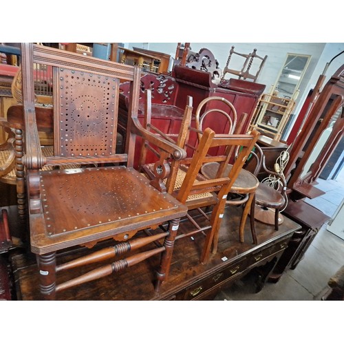 948 - A walnut armchair together with two bentwood chairs and two Edwardian bedroom chairs.