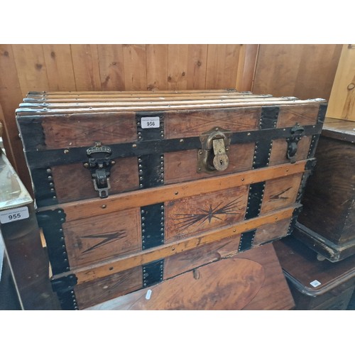 956 - A vintage leather bound travel trunk.