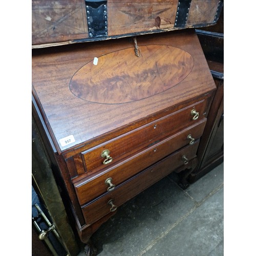 957 - A mahogany bureau.