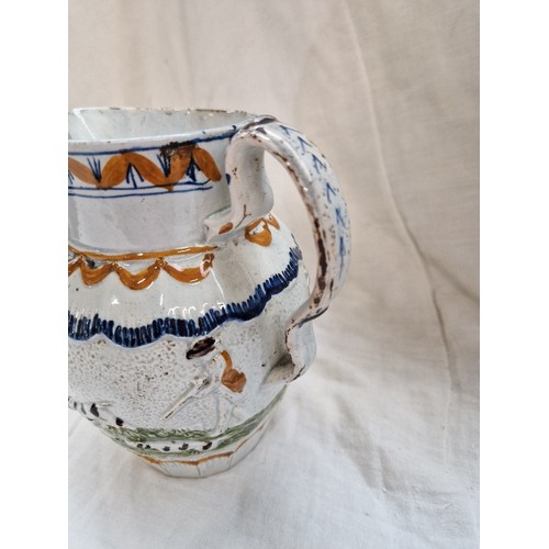 558 - A blue and silver lustre jug and Prattware hunting jug (cracked), together with 3 pieces of hand pai... 