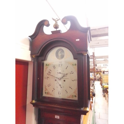 829 - A George III eight day mahogany long case clock with weights and pendulum, quarter columns to the ca... 