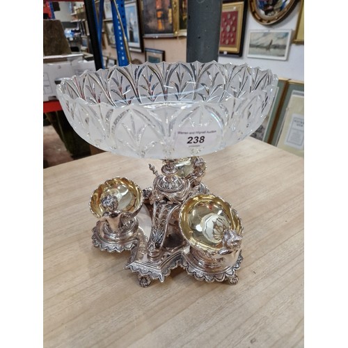 238 - A Victorian style silver plated table centrepiece with cut glass fruit bowl and 3 detachable nut bow... 