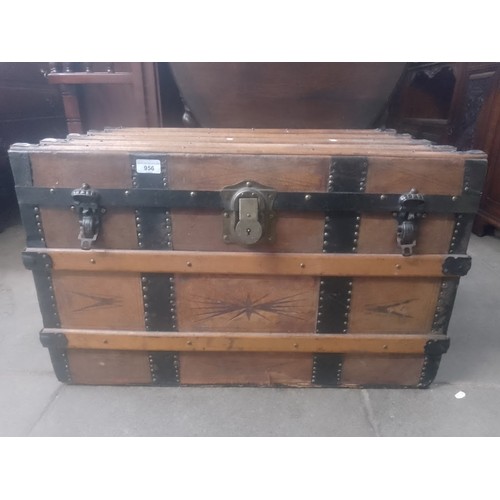 956 - A vintage leather bound travel trunk.