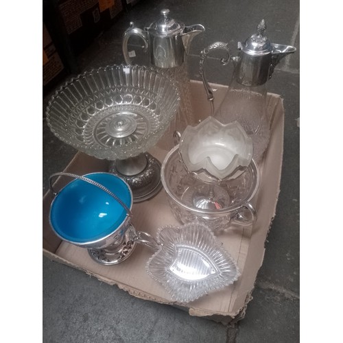 99 - A box of glassware and plated ware.