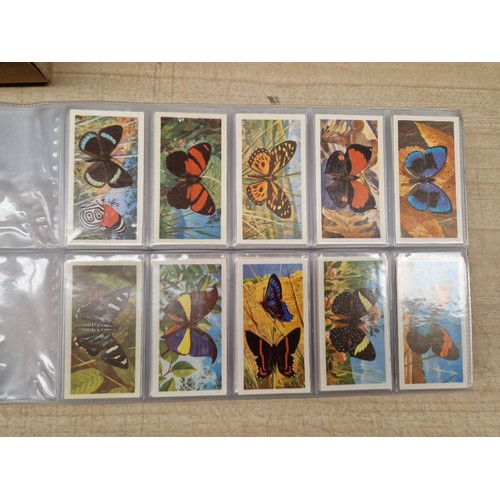 429 - Five albums of assorted cigarette cards.