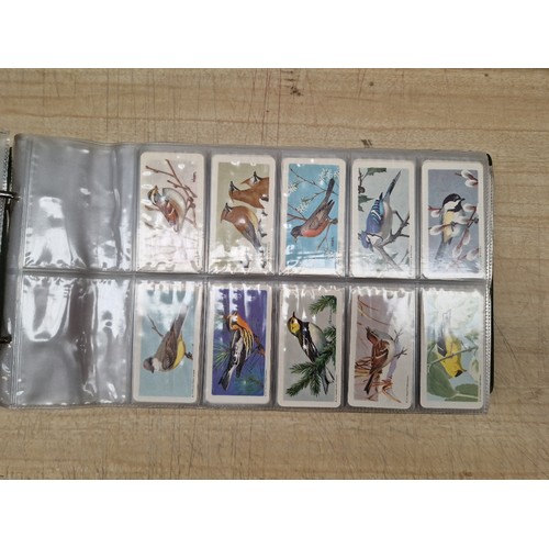 429 - Five albums of assorted cigarette cards.