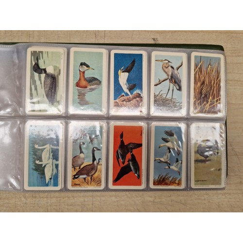 429 - Five albums of assorted cigarette cards.