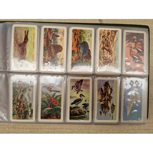 429 - Five albums of assorted cigarette cards.