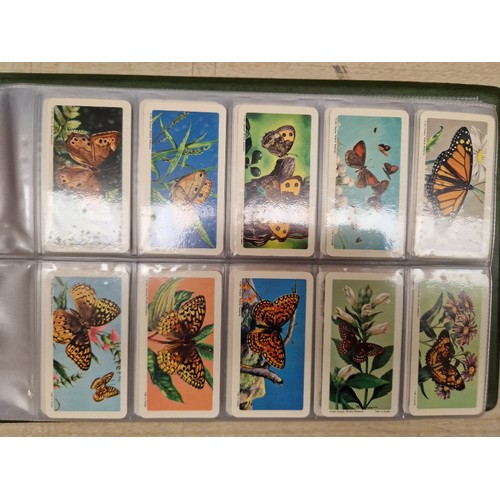 429 - Five albums of assorted cigarette cards.