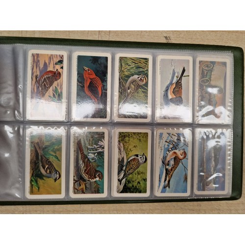 429 - Five albums of assorted cigarette cards.