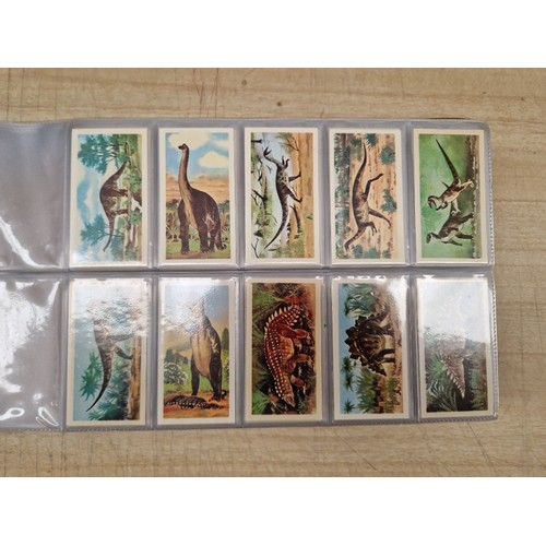 429 - Five albums of assorted cigarette cards.