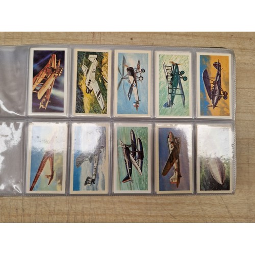 429 - Five albums of assorted cigarette cards.