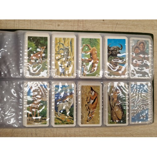 429 - Five albums of assorted cigarette cards.