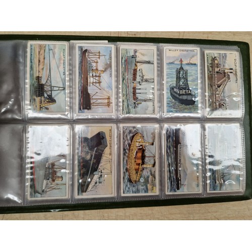 429 - Five albums of assorted cigarette cards.