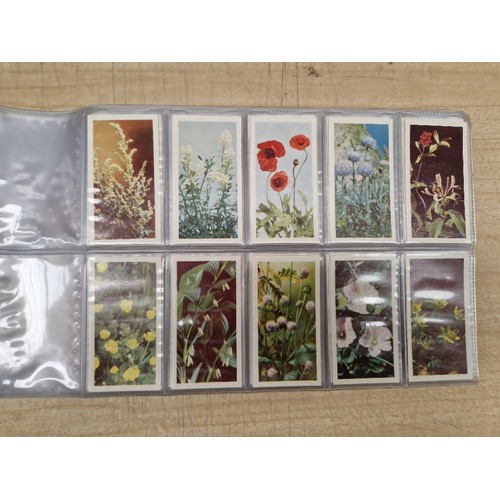 429 - Five albums of assorted cigarette cards.