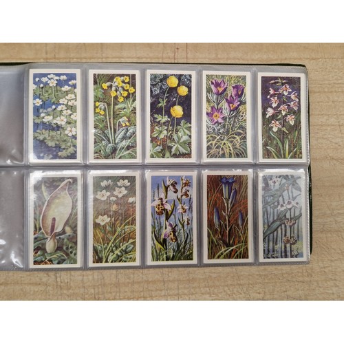 429 - Five albums of assorted cigarette cards.