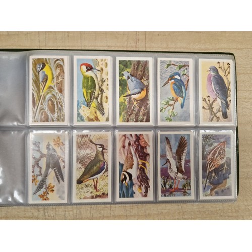 429 - Five albums of assorted cigarette cards.