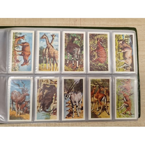 429 - Five albums of assorted cigarette cards.