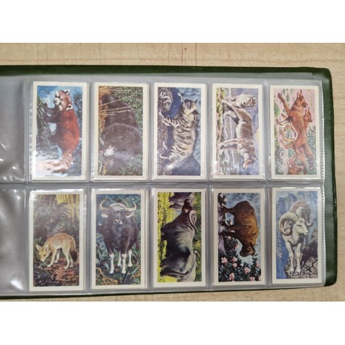 429 - Five albums of assorted cigarette cards.