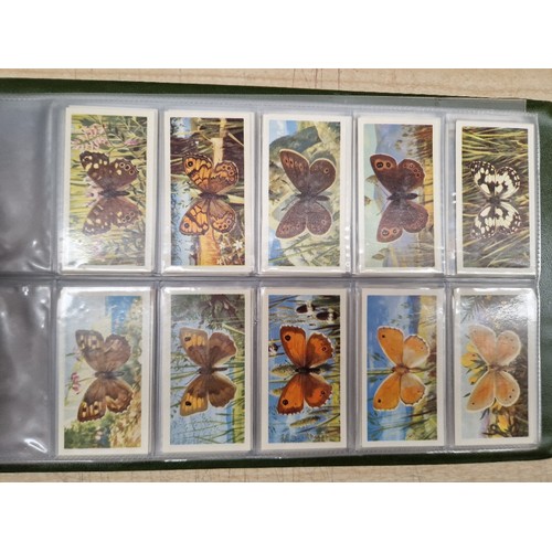 429 - Five albums of assorted cigarette cards.