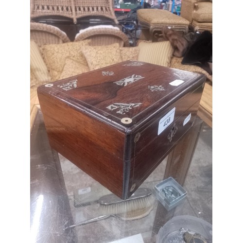 438 - A 19th century rosewood and mother of pearl jewellery/sewing box.