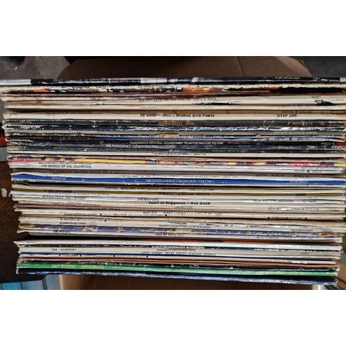 303 - A box of vinyl LP records, various artists, mostly rock and pop.