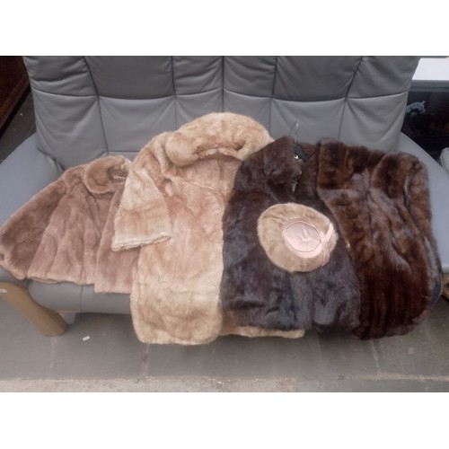 104 - 4 boxes of various furs and related accessories.