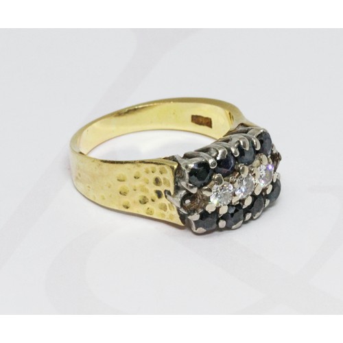 62 - A sapphire and diamond ring, marked '18ct', gross weight 6.5g, size M.