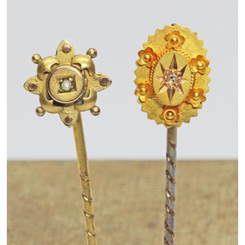 71 - Two antique stick pins; one set with a diamond and marked '18ct', the other set with a seed pearl an... 