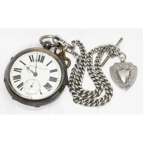 186 - A hallmarked silver pocket watch with silver Albert chain T bar and fob. weight without watch 1.77oz... 