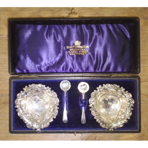 255 - A cased pair of late Victorian hallmarked silver salts.