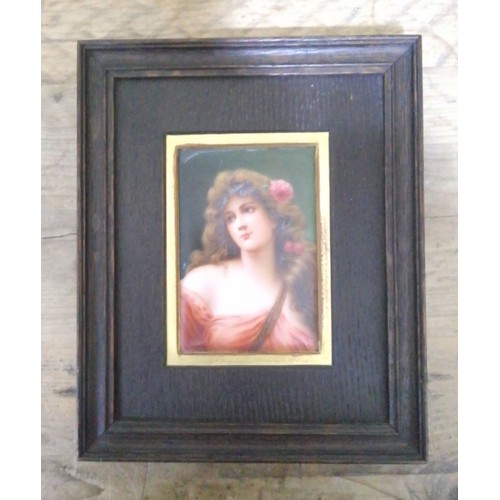 267 - A continental porcelain plaque, circa 1900, hand painted portrait depicting a girl, indistinctly sig... 