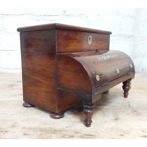 259 - A 19th century Rosewood and mother of pearl inlaid stationary box modelled as a piano, length 23.5cm... 