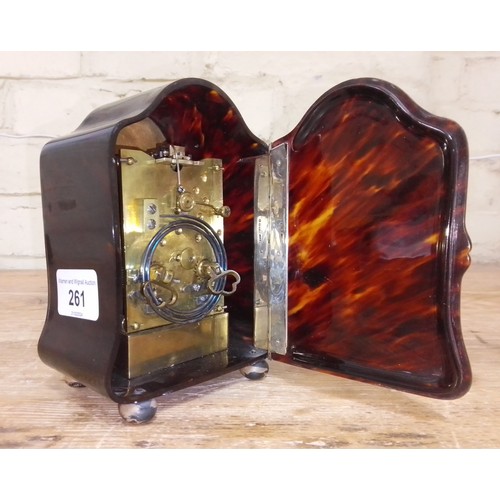 261 - An Edwardian silver inlaid tortoiseshell mantle clock, hallmarked silver hinged back, sponsor 'H.A&O... 