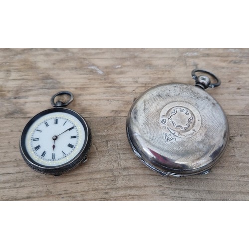 329 - A silver pocket watch, 1889, Birmingham, JD, together with a Swiss made pocket watch, marked 0.935.