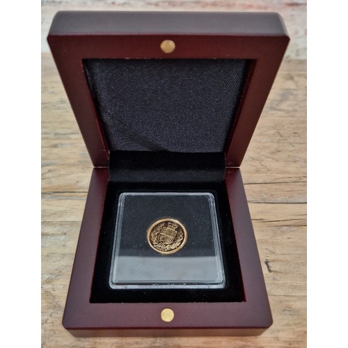 319 - A 2002 22-Carat Gold half sovereign, 3.99g, boxed with certificate, Buyer's premium 12% (Inclusive o... 