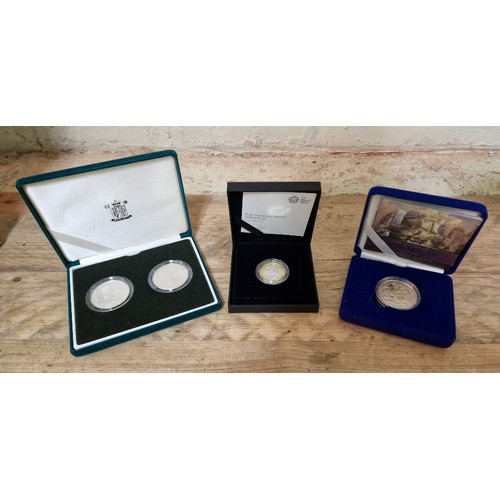 322 - Royal Mint, Three silver coins/sets comprising of a Bravery in the Skies RAF Centenary Spitfire 2018... 