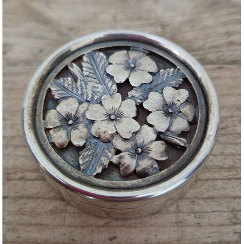 342 - A hallmarked silver trinket box with flowers decoration on lid, London, Peter Nicholas & Co Ltd, 199... 