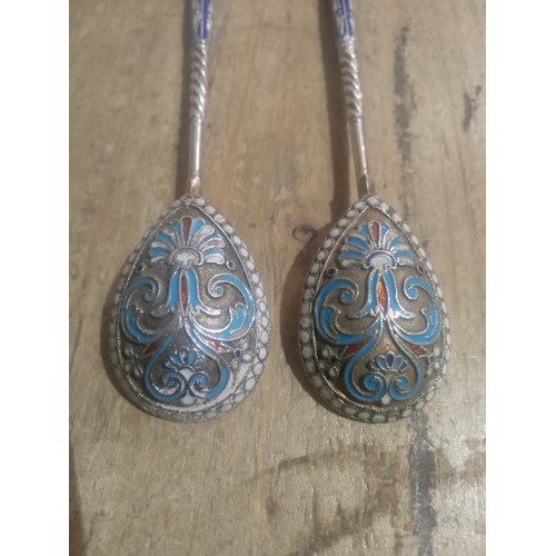 350 - A pair of Russian silver and cloisonné enamel spoons, Kokoshnik mark for Moscow, 84 zolotniki, the b... 