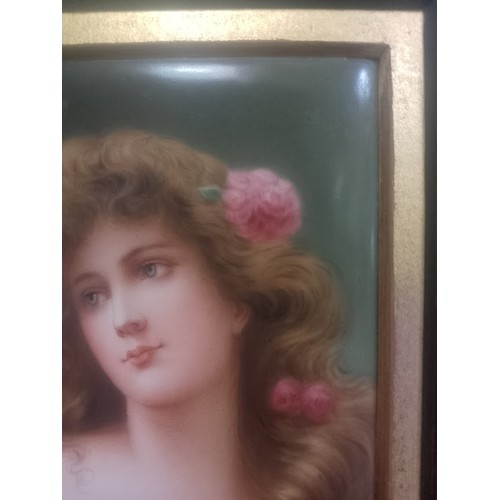 267 - A continental porcelain plaque, circa 1900, hand painted portrait depicting a girl, indistinctly sig... 