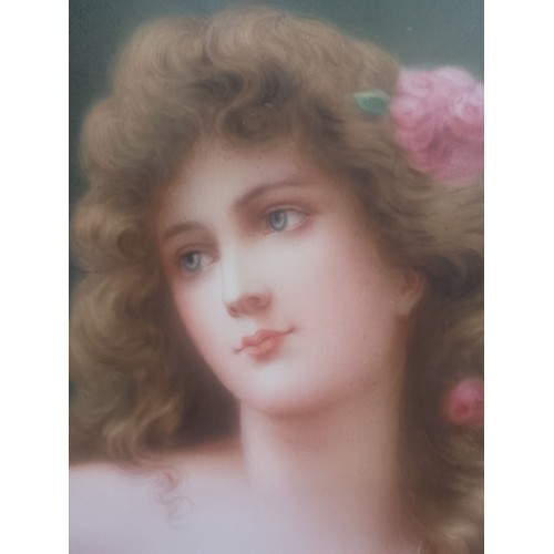 267 - A continental porcelain plaque, circa 1900, hand painted portrait depicting a girl, indistinctly sig... 