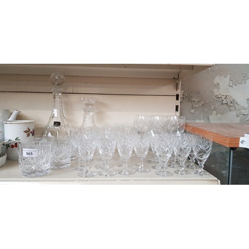 565 - Lead crystal - Royal Doulton decanter and another decanter, 34 glasses including makers such as Edin... 