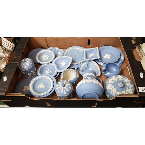 601 - A box of blue and white Wedgwood Jasperware.