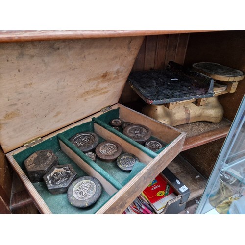 68 - A set of vintage Avery scales together with a box of weights.