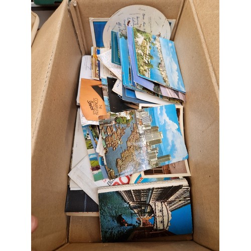 71 - A box of vintage postcards.