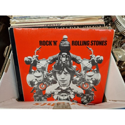 99 - A box of pop and rock LPs including Rolling Stones, Elton John, etc.